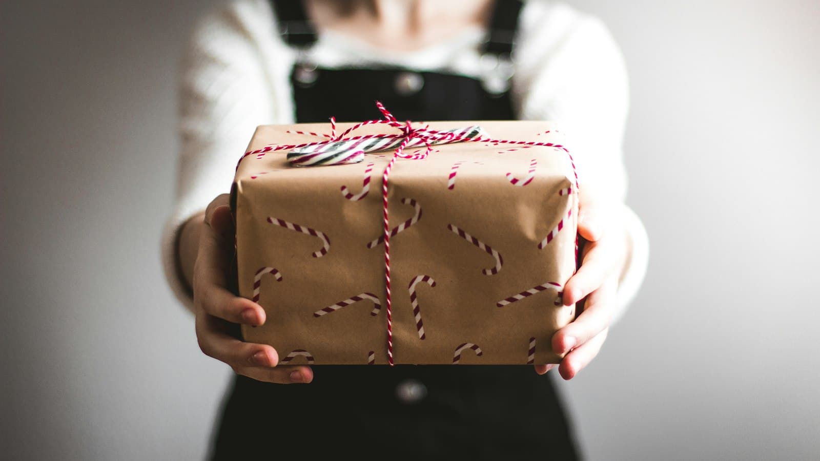 Holiday gifts and packaging arranged for seasonal ecommerce merchandising