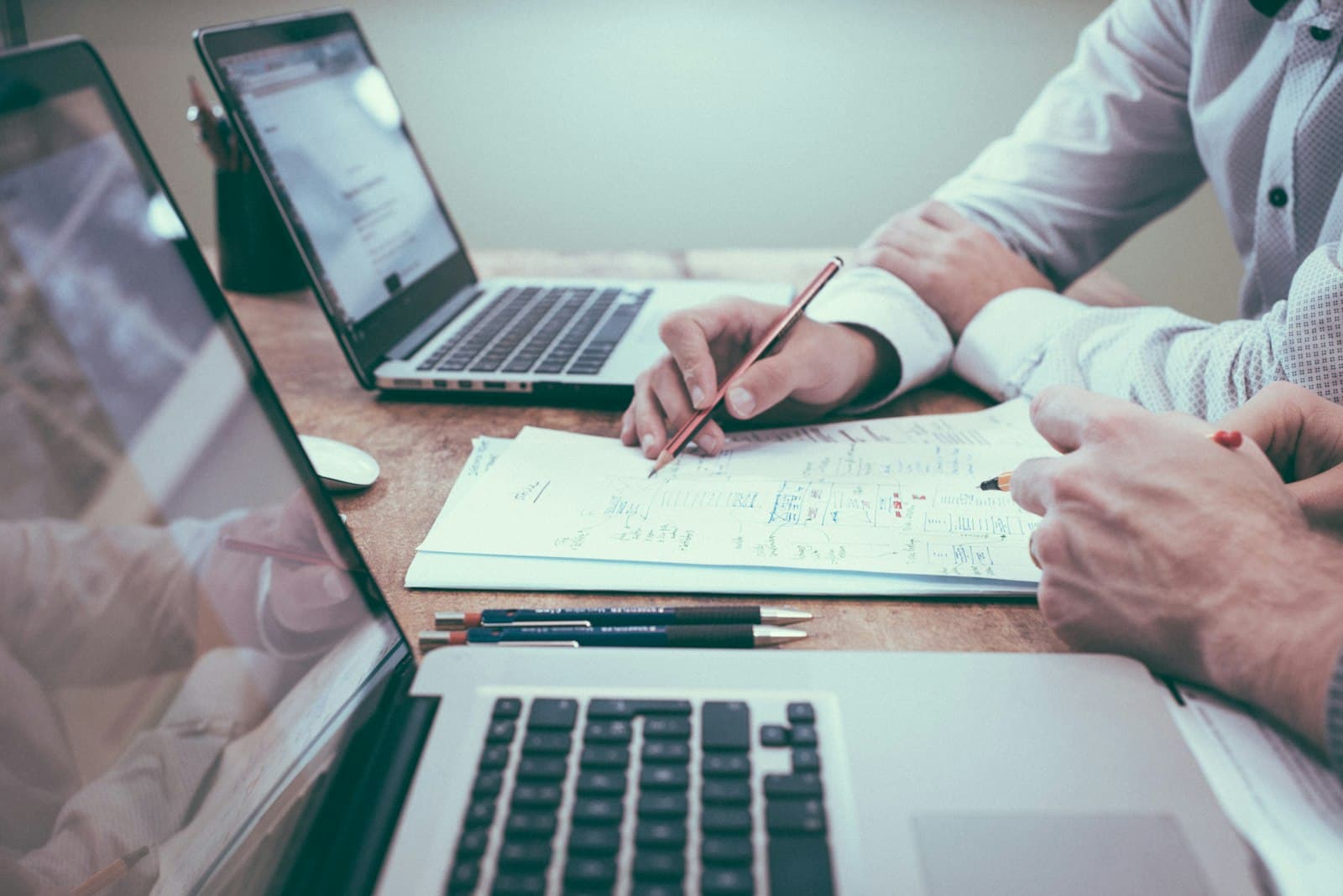 Spreadsheet and catalog workflow representing bulk Shopify product management